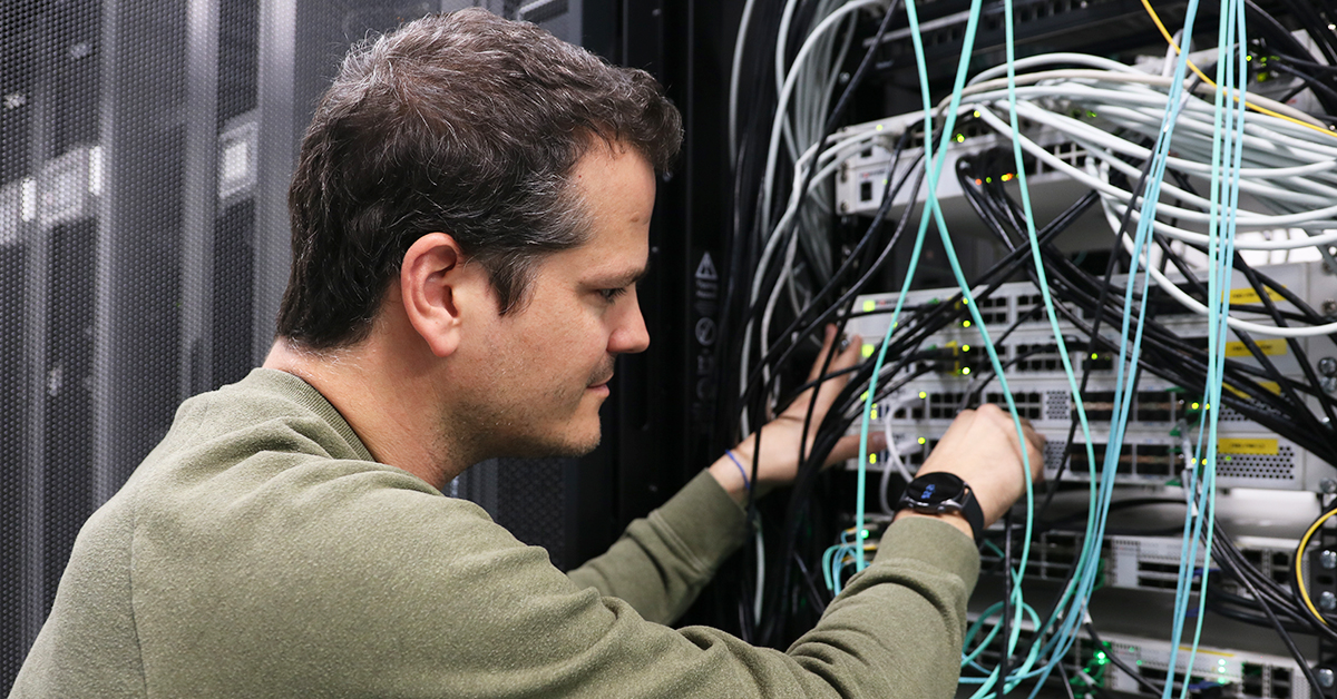 IT technician performing safety cibersecurity against malware