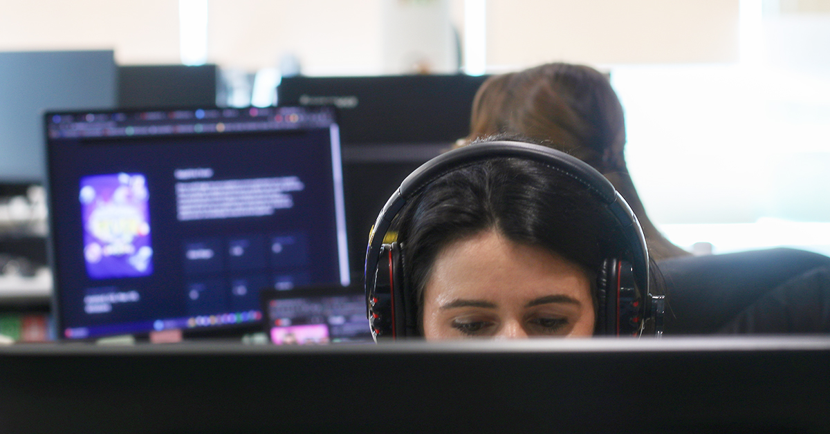 it recruiter working at the computer at a software house preparing for interview